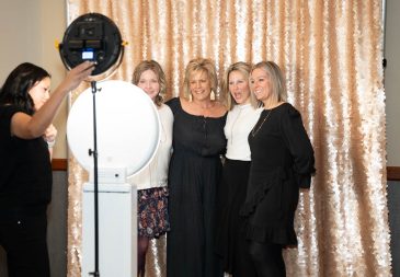 Group of women smile at photo booth at Midlothian Chamber Annual Awards Night
