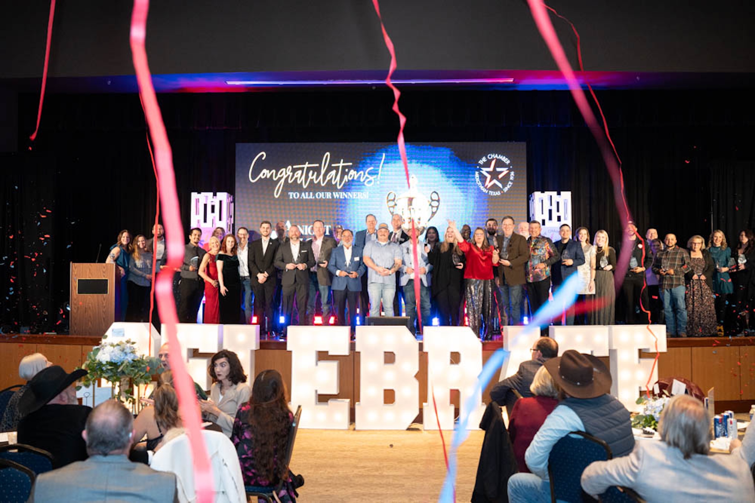Midlothian Chamber of Commerce Annual Awards Gala winners on stage with confetti