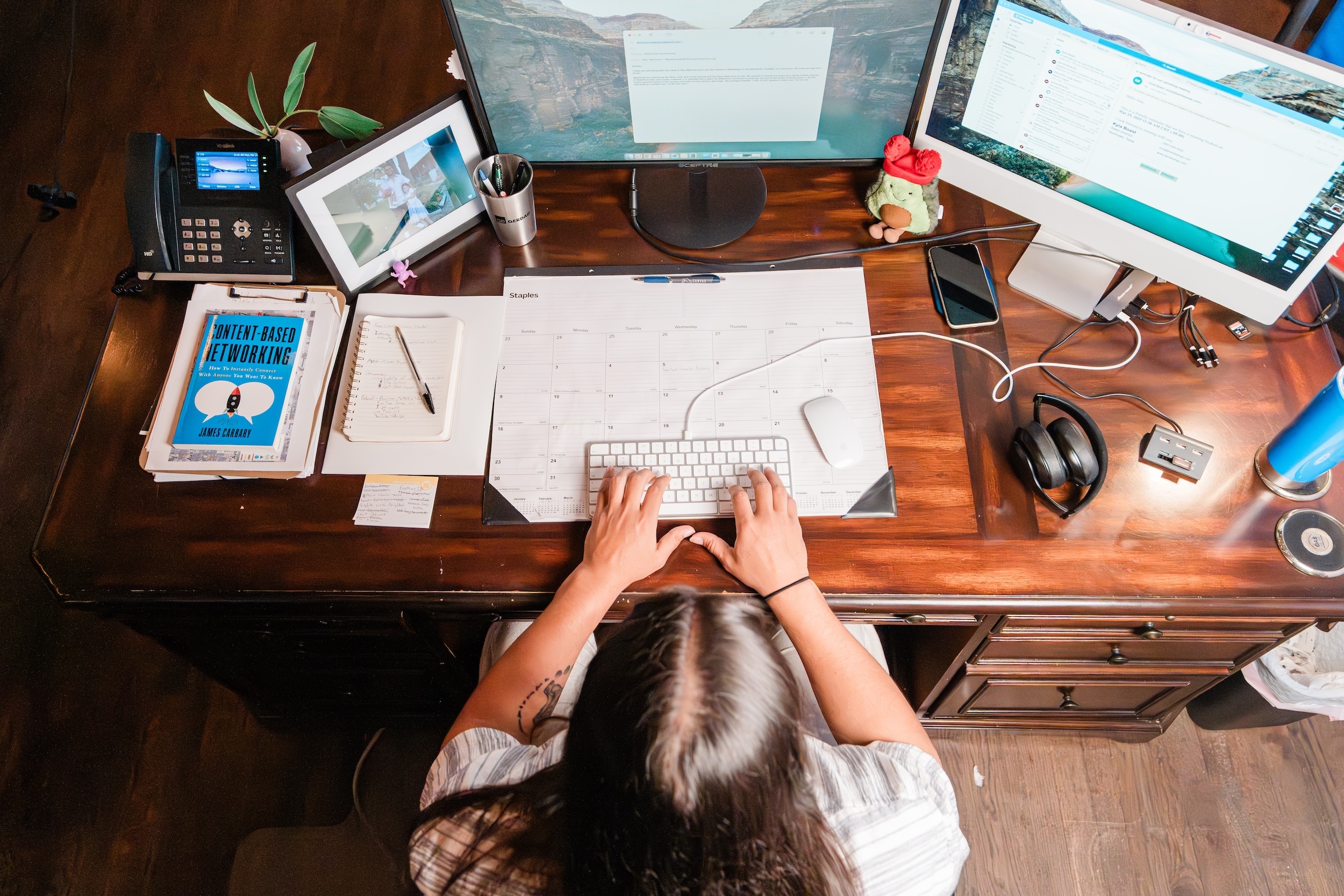 Alec Martinez working at desk in Midlothian Chamber office