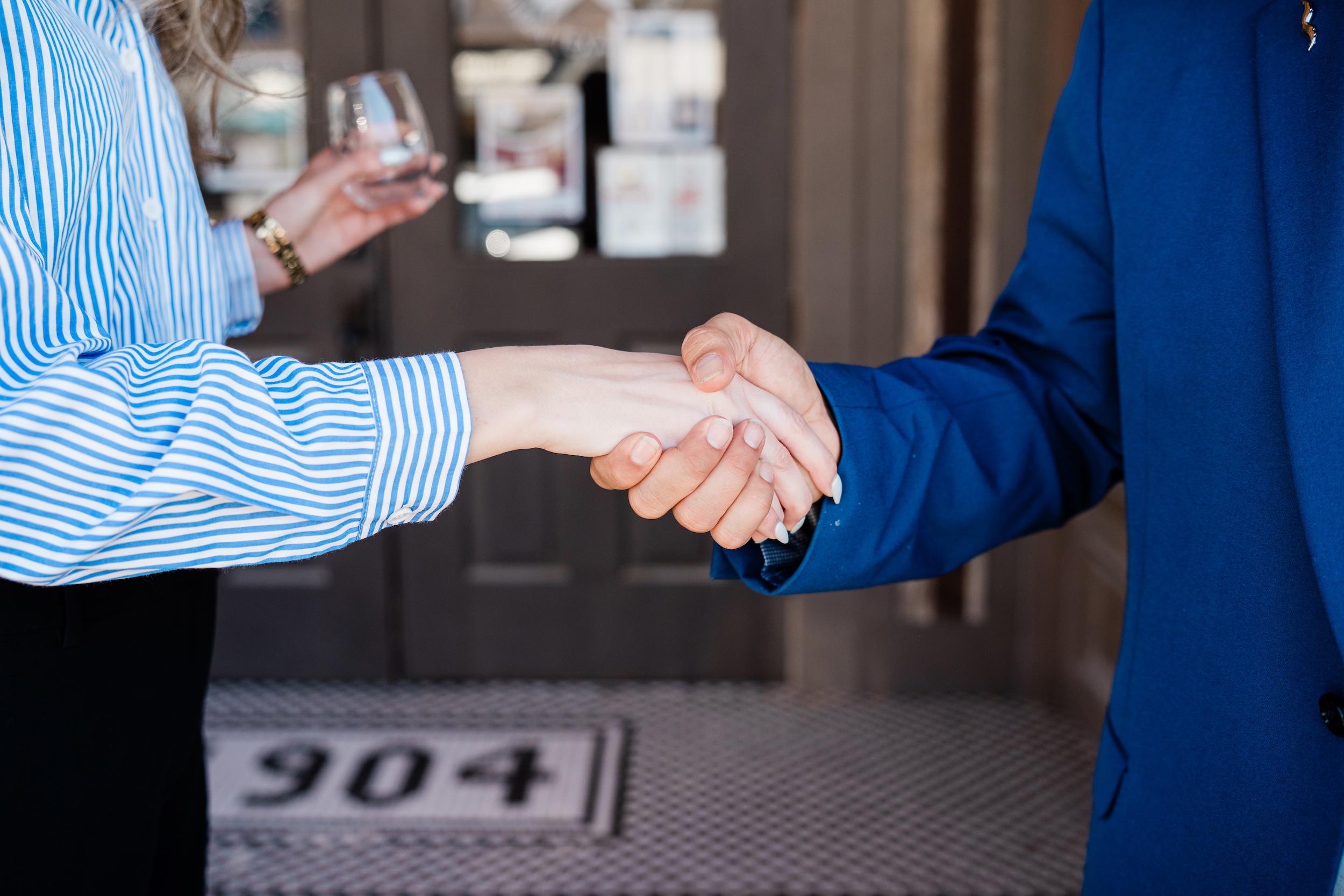 Handshake between Midlothian Chamber of Commerce staff