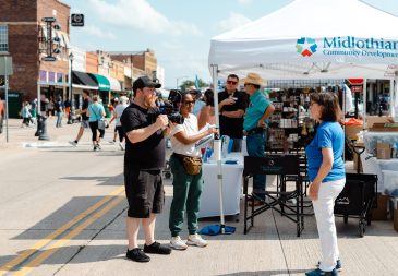 Group of people filming at Chamber MidloFest