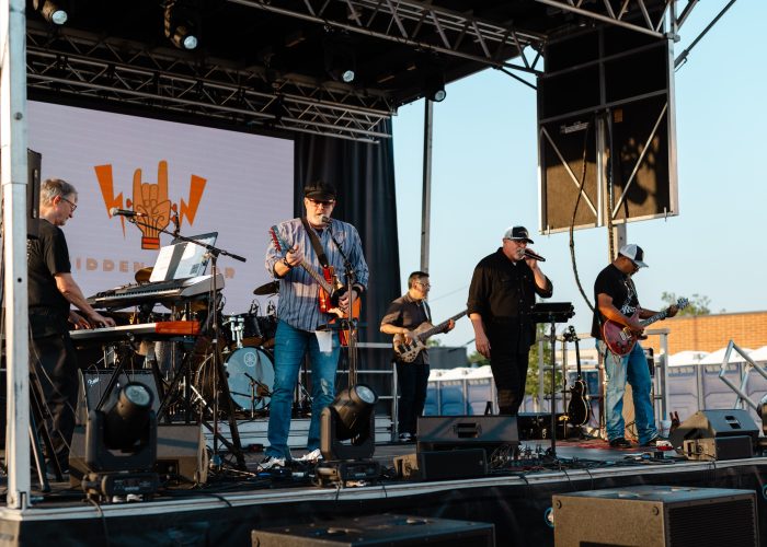 Live music performers on stage at Chamber MidloFest