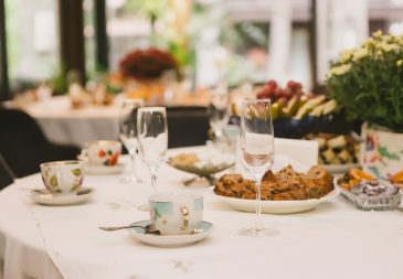 Appetizers and drinks on a decorated table at an event