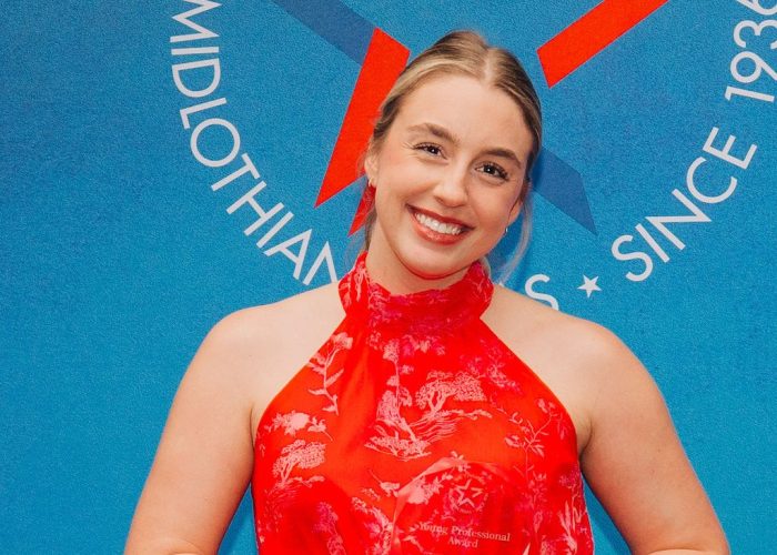 Annabel Gaul of Midlothian Economic Development receiving Young Professional of the Year award